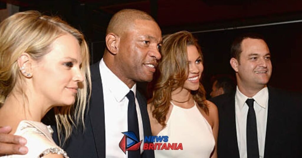 Callie Rivers with  Doc Rivers and others